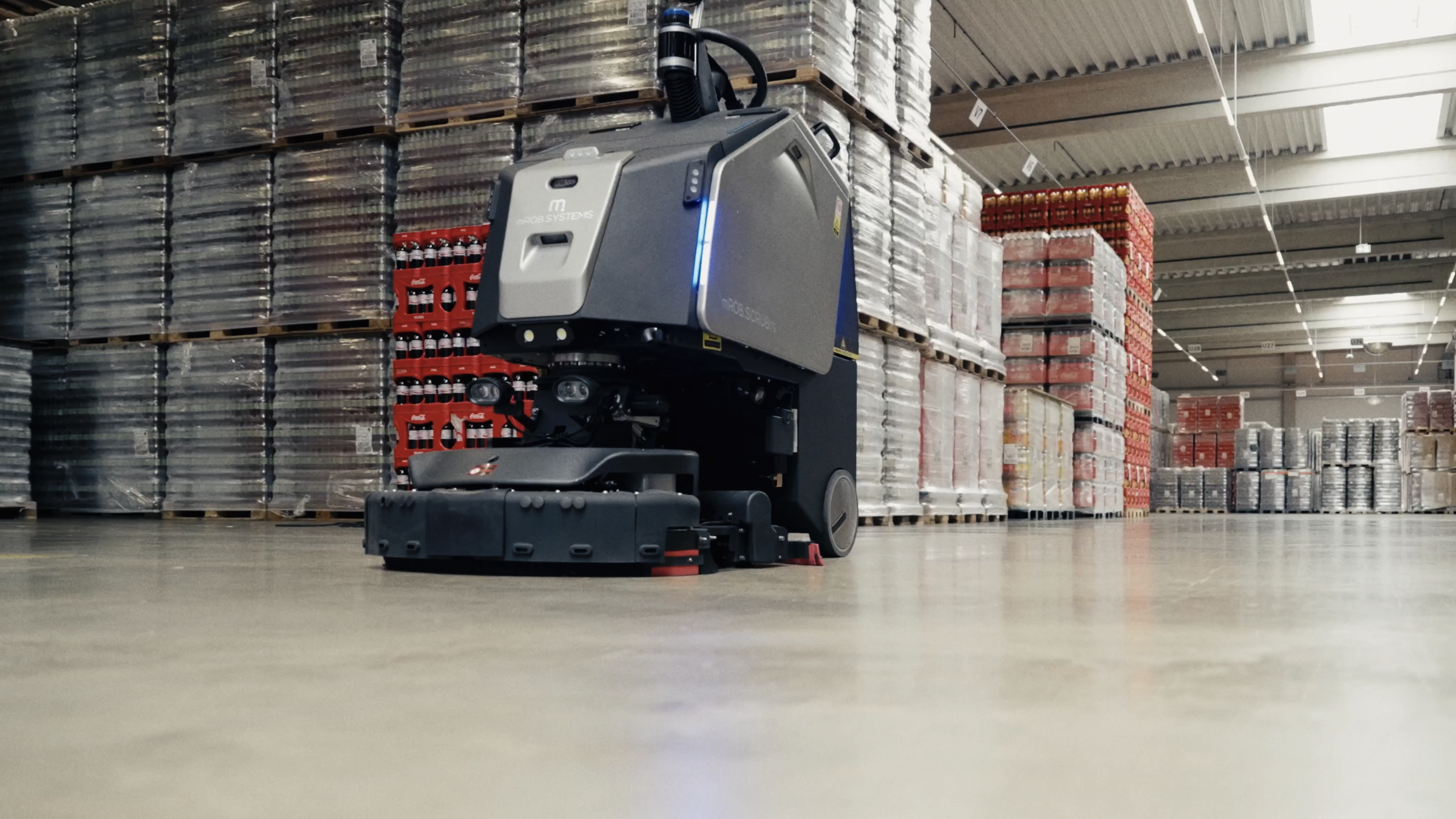 Gausium and mR Mobile Robots Help Coca-Cola to Automate Warehouse Cleaning at German Facility